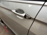 a close up of a door handle on a car