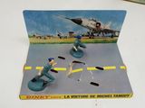 toy figurines of military men playing a game with a plane in the background