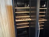 an image of a refrigerator with many shelves and shelves