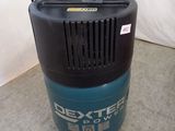 a blue and black air compressor sitting on top of a gray floor