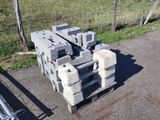 a pile of concrete blocks sitting on the side of the road
