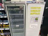 a refrigerator that is sitting in the middle of a store