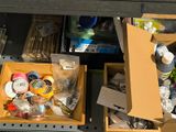 many items in the boxes on the shelf in the store