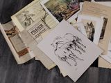 a pile of old books on a table with a drawing of a horse