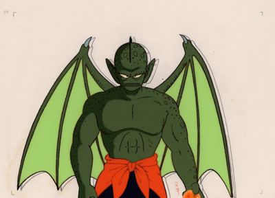 an image of a cartoon of a demon with a red bow