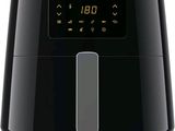 La friteuse à air chaud Philips est noire et dispose d'un écran numérique