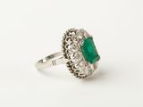 an emerald and diamond ring