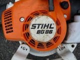 a close up view of a stihl blower on the ground