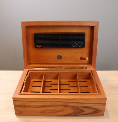 an image of a wooden box that has a radio inside of it