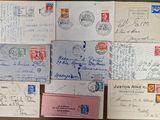 many old letters and envelopes on the table