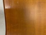 a close up of a wooden chair with a wooden seat and back
