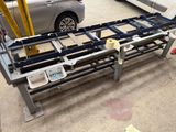 an image of a car being worked on by a machine