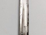 a knife that is sitting on a table