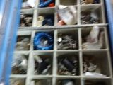 a blue box filled with lots of assorted items