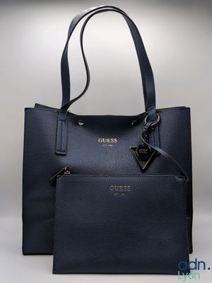 a close up of a handbag with a purse attached to it