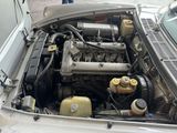 a small engine in the engine bay of a car