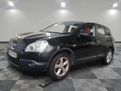 a picture of a black nissan rav on a checkered floor