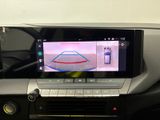 the interior of a car with a digital display on the dashboard