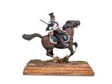 statue of a man riding a horse on a wooden base