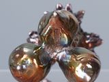a glass sculpture of a frog sitting on top of a table