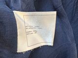 the label is on the jacket of a man ' s jacket