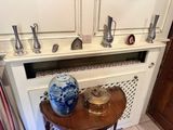 a small table with a vase on top of it