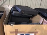 a box full of luggage sitting in a warehouse