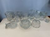 a table with a lot of glass items on it