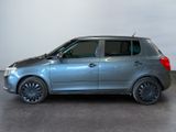 a picture of a silver car parked in a garage