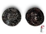 an image of two roman coins with a face on them