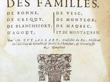 an old book with a picture of a vase of flowers on top of it
