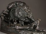 a bronze sculpture of a boar and a baby boar