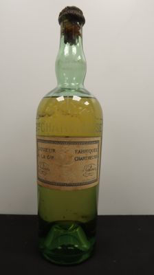 an image of a bottle of alcohol sitting on a table