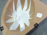 a table that has a paper cut out of it