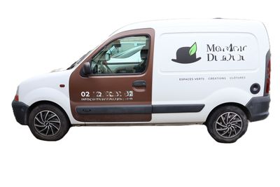 the van is parked on the side of the road with its door open
