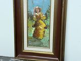 tableau représentant une femme en robe jaune tenant un oiseau dans la main