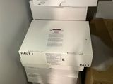 two boxes stacked on top of each other on the floor