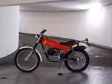 a motorcycle that is parked in a parking garage