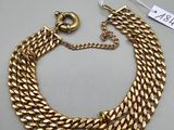 an image of a gold chain bracelet with a clasp