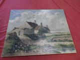 une vieille photo représentant une peinture d'une maison sur une toile rouge