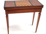 a small table with a chess board on it