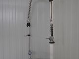 a sink with a faucet and a faucet attached to it
