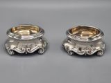 pair of silverplated candlesticks with floral decoration