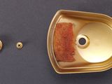 a tin with a piece of food inside of it