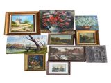 many paintings on the wall of this room together