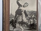 an old photo of a woman dancing in the middle of a book