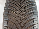 a close up of a tire on a wooden surface