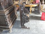 a lot of antique items on display in a store