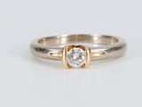 an image of a diamond ring on a white surface