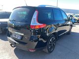 a picture of a black car parked in a parking lot